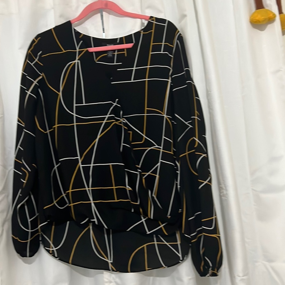Black white and orange blouse